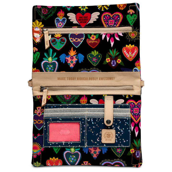 Consuela Vida Metro Crossbody open interior showing zip pocket, card slots, and leather tag