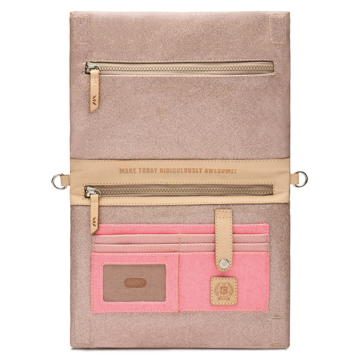 Consuela Emery Metro Crossbody shown open, revealing an interior zip pocket stamped Make Today Ridiculously Awesome, pink card slots, and a clear ID window.
