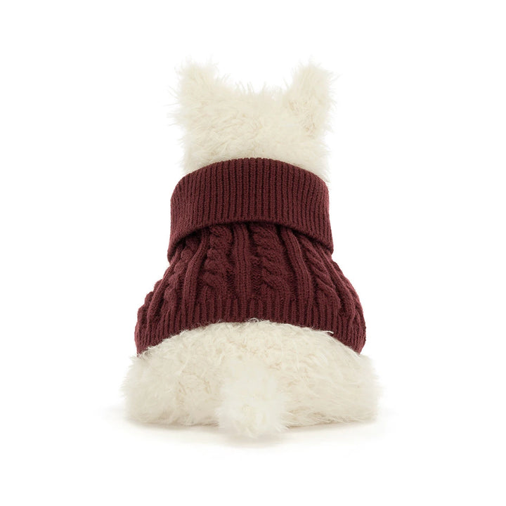 Jellycat Munro Scottie Dog plush wearing a cozy knitted winter jumper — a soft, shaggy Scottie dog.