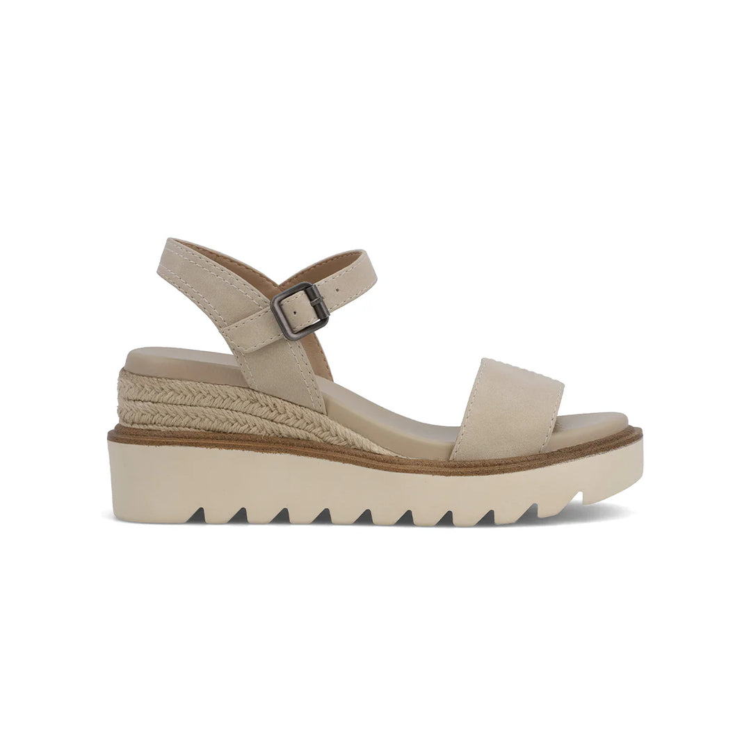 Side view of the MIA Ophidia wedge showing the 3-inch raffia-wrapped heel and lugged platform sole.