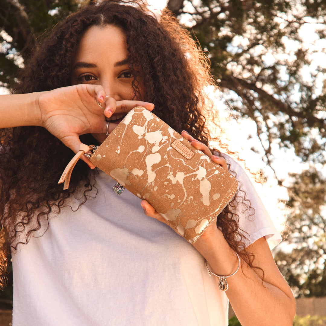 Consuela Beau Essential Wallet featuring a metallic hand-splattered leather suede exterior.