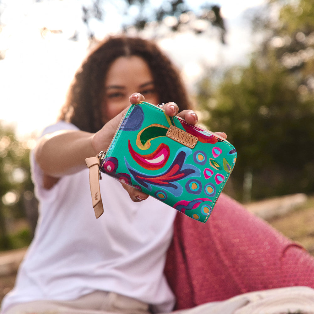 Consuela Cyndi Zippy Wallet featuring a premium black leather exterior.