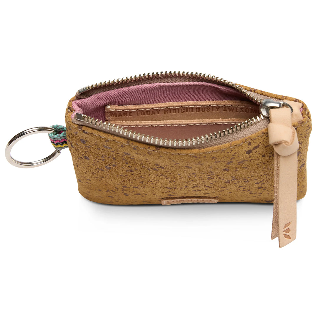 Interior view of the Cider Pouch showing the credit card slot and attached metal keyring.