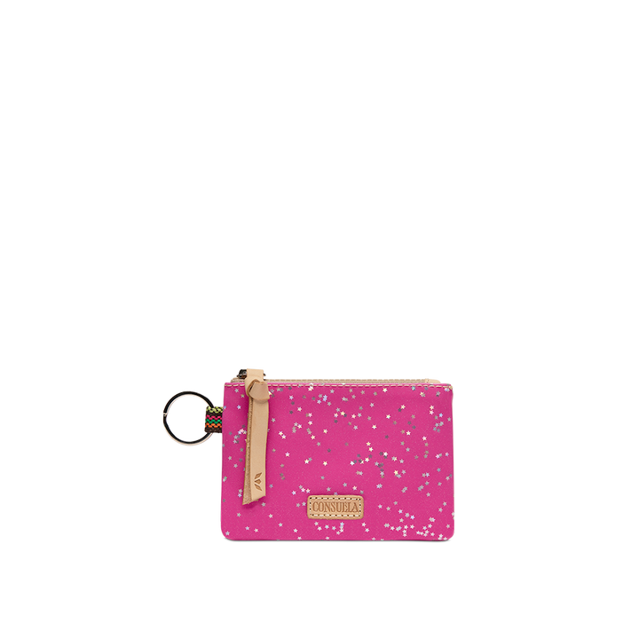 Consuela Berry pouch, with a silver glitter speckle pattern, a natural leather strap, and a metal keyring.