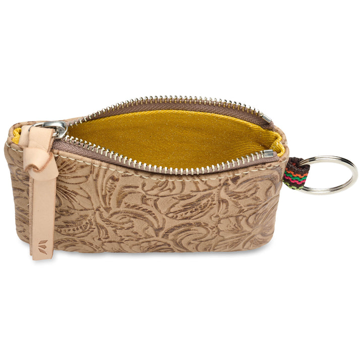 consuela Lawton pouch, featuring a bright yellow interior lining, a natural  leather pull tab, and a silver metal key ring.