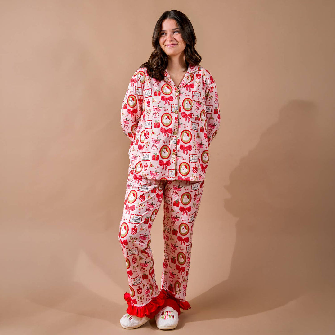 Buttery-soft stretch holiday pajamas by The Darling Effect in the Mistletoe Magic print.