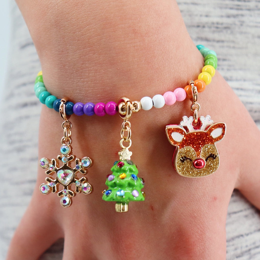 Charm It Gold Glitter Reindeer charm on a rainbow bead holiday stretch bracelet