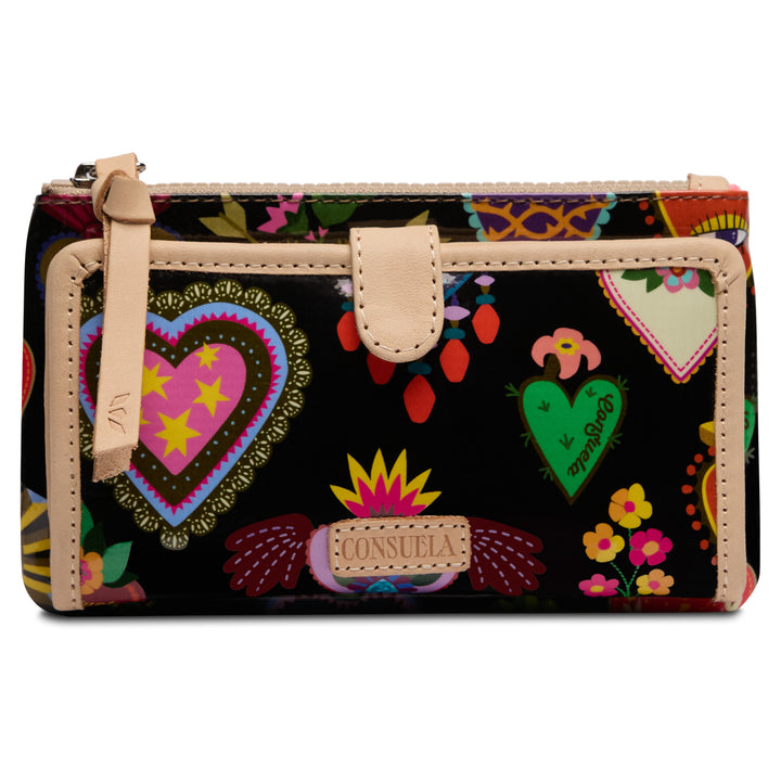 Consuela Vida Slim Wallet front — black folk-art heart and floral print with blush leather trim and Consuela nameplate