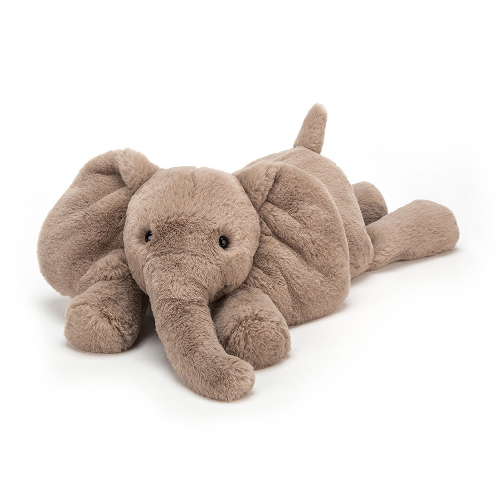 Jellycat Smudge Elephant plush; floppy grey-brown elephant with large ears in a sitting position.