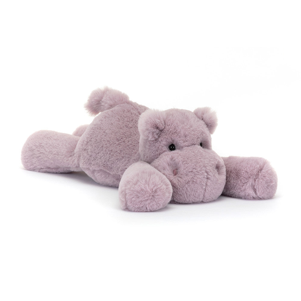 Plush hippo toy on a white background