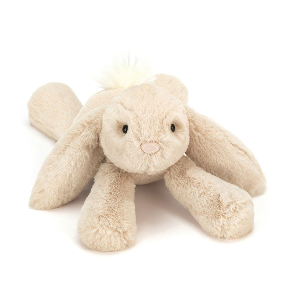 Jellycat Smudge Rabbit plush toy showcasing its incredibly soft cream fur, large floppy ears, and relaxed sitting pose.
