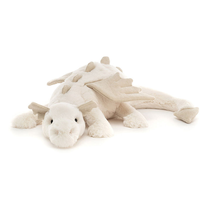 Large, soft cream-colored Jellycat Snow Dragon with sparkling rose-gold wings and scales.