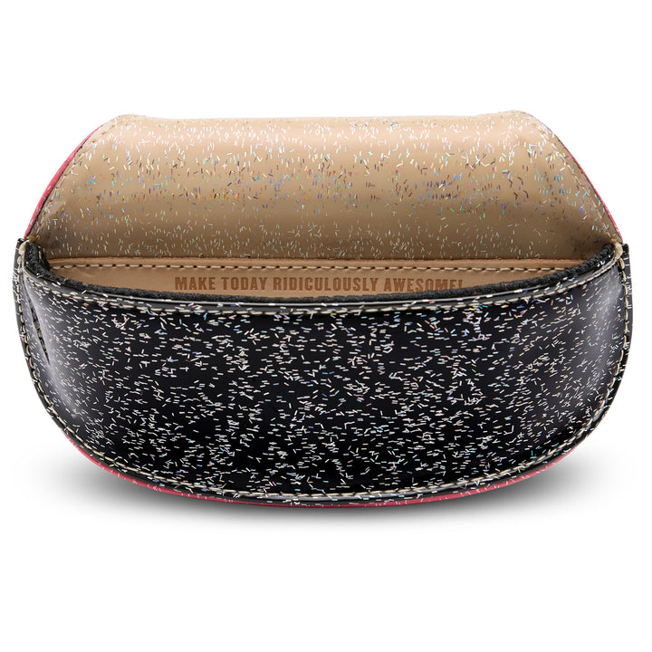 Consuela Bae Sunglass Case featuring a multicolored glitter exterior and natural leather logo patch.