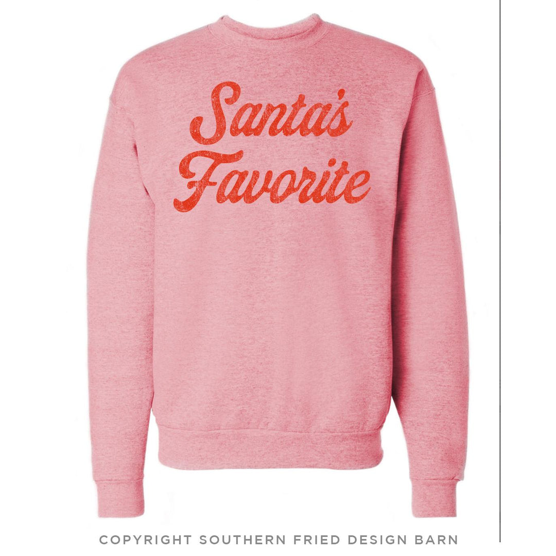 Soft pink Southern Fried Design Barn holiday sweater featuring red hand-illustrated "Santa&