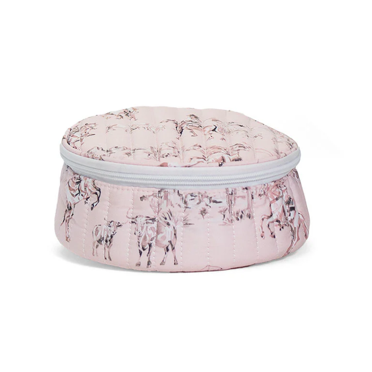 Round quilted jewelry travel case in pink and white Cowgirl Toile print with top handle and white zipper.