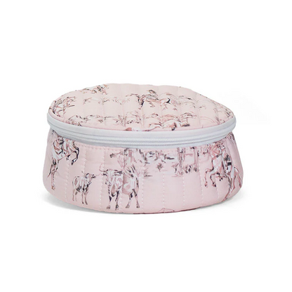 Round quilted jewelry travel case in pink and white Cowgirl Toile print with top handle and white zipper.