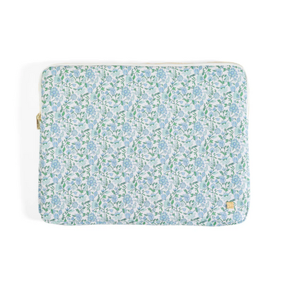 Padded 14-inch laptop sleeve in blue and white Hamptons Floral print with a white zipper.