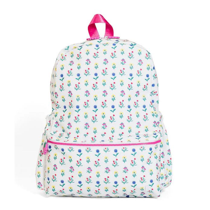 TRVL Design Backpacker kids school backpack in the signature Wild Flower floral patterned print layout.
