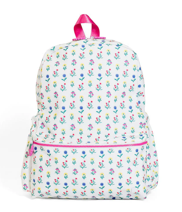 TRVL Design Backpacker kids school backpack in the signature Wild Flower floral patterned print layout.