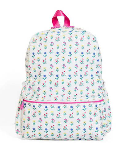 TRVL Design Backpacker kids school backpack in the signature Wild Flower floral patterned print layout.