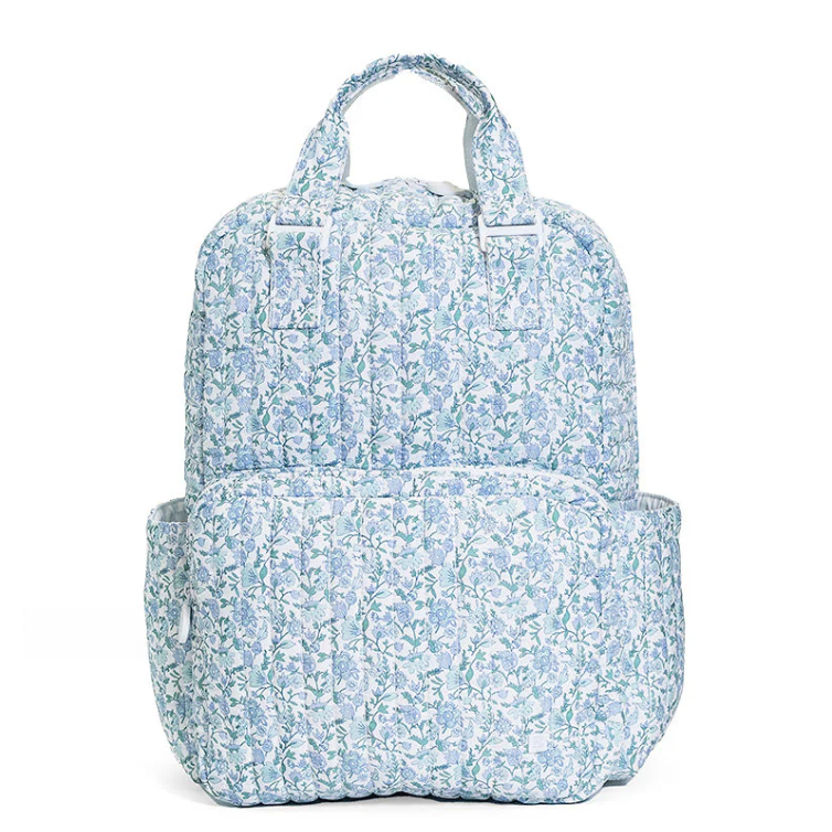 TRVL Design Quilted Roadie medium cosmetic zip pouch bag featuring a blue and white Hamptons Floral pattern.