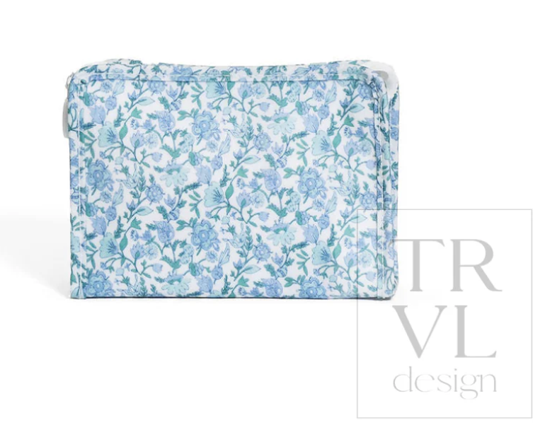 TRVL Design Roadie Small Zip Pouch in Hamptons Floral print highlighting its compact cosmetic bag shape and secure top zipper.
