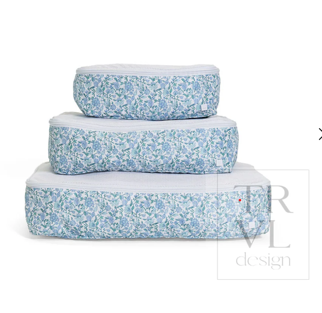 TRVL Design Luxe Packing Squad Packing Cubes set in Hamptons Floral print showcasing its nested multi-size layout and mesh panels.