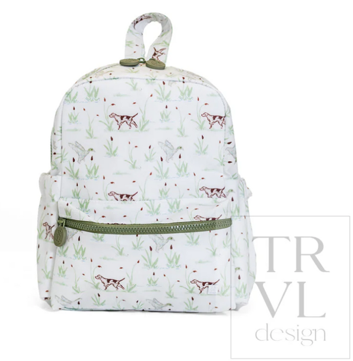 TRVL Design Mini Backer small backpack in The Hunt wildlife print highlighting its petite single-compartment shape and top carry handle.