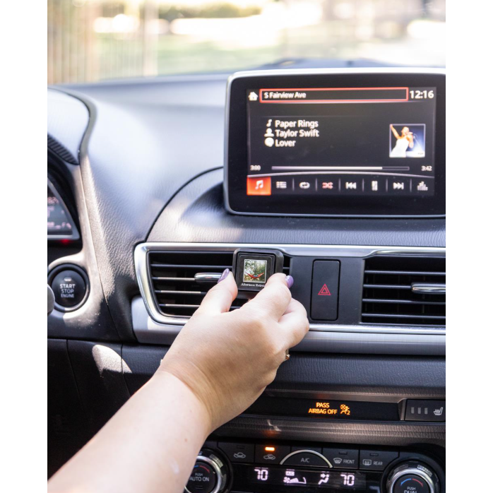Bridgewater Afternoon Retreat Auto Vent Clips being installed on a car air vent.