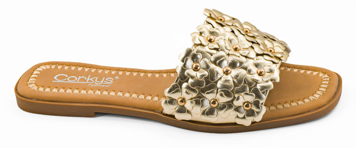 Corkys Spring Fever floral slide in gold metallic featuring 3D flowers and shimmering metallic accents on a square-toe flat.
