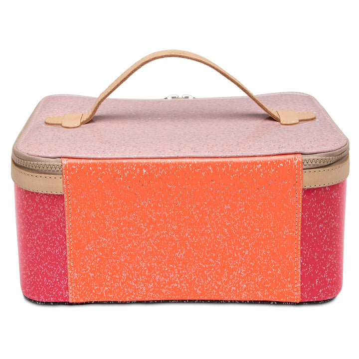 Consuela Bae Train Case featuring a bright multi-colored glitter exterior and natural leather trim.