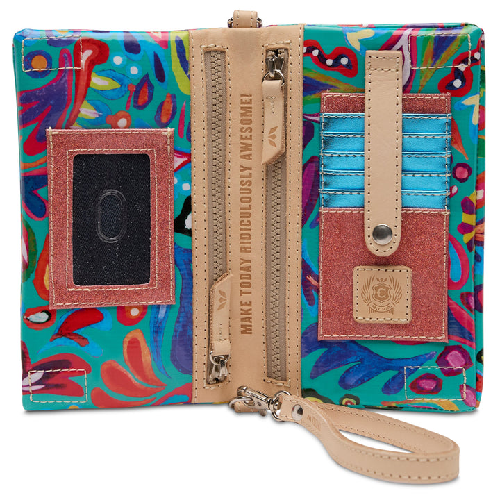 Consuela Tasha Uptown Crossbody bag featuring a colorful floral ConsuelaCloth exterior.