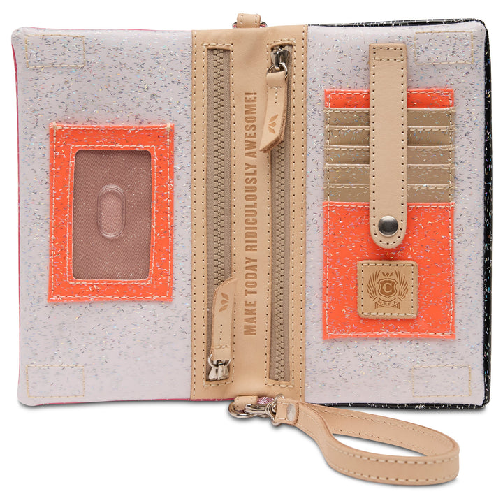 Consuela Bae Uptown Crossbody bag featuring a multi-colored glitter exterior and leather trim.