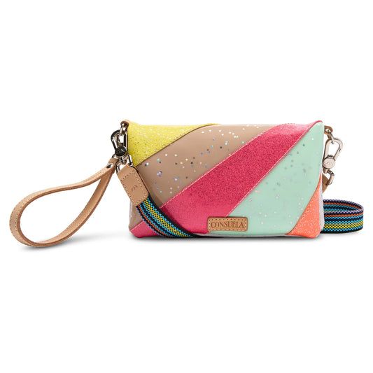 Consuela Tilted Uptown Crossbody with vibrant geometric pattern; convertible bag with 3 zip compartments and card slots.
