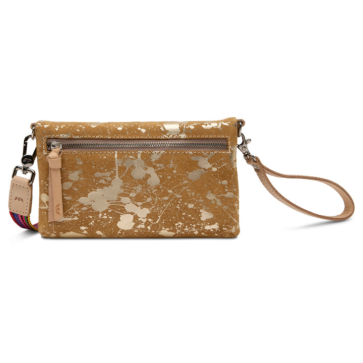 Consuela Marlow Uptown Crossbody bag featuring a metallic hand-splattered leather suede exterior.