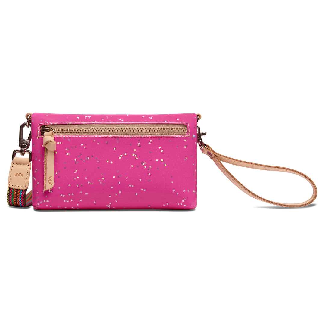 Back of the Consuela Berry Uptown Crossbody showing the star-print zip pocket and tan leather wristlet strap