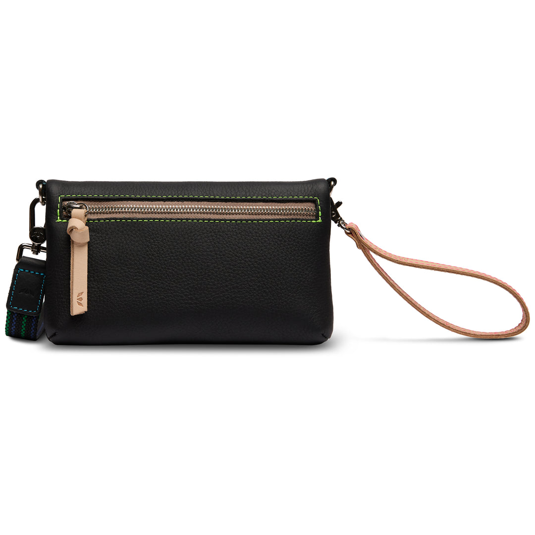 Back of the Consuela Cyndi Uptown Crossbody showing the black leather zip pocket with lime-green stitching and tan leather wristlet