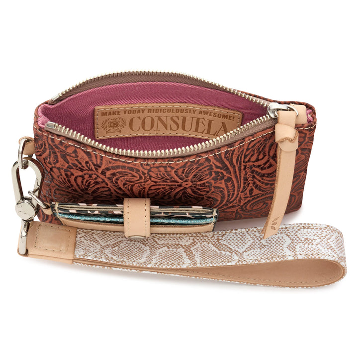 Consuela Sally Combi featuring a brown tooled leather exterior pouch, Diego leather cardholder, and snake print wristlet strap.