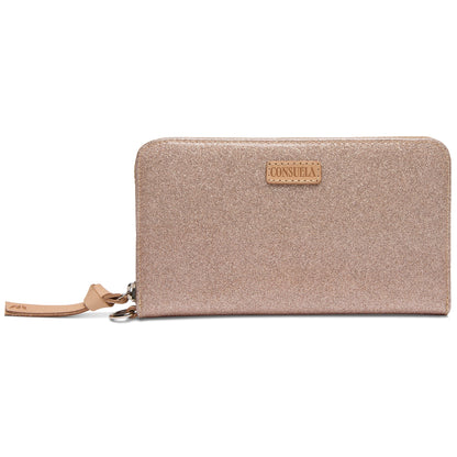 Consuela Emery Essential Wallet in champagne glitter finish with natural leather logo.

