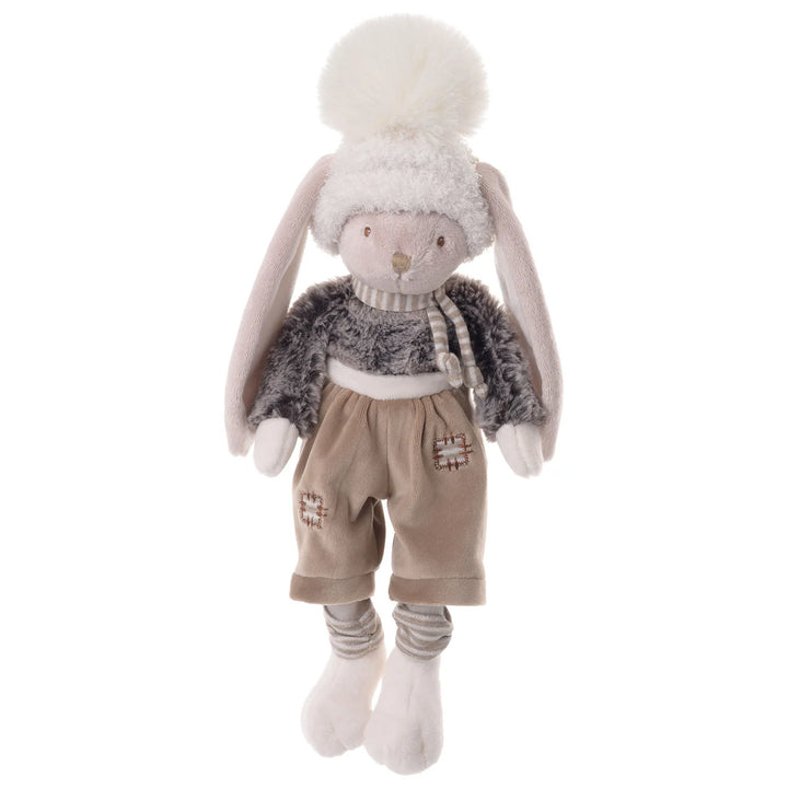 12-inch blonde plush rabbit named Deen wearing tan pants, a grey fuzzy sweater, and a knit pom-pom hat.