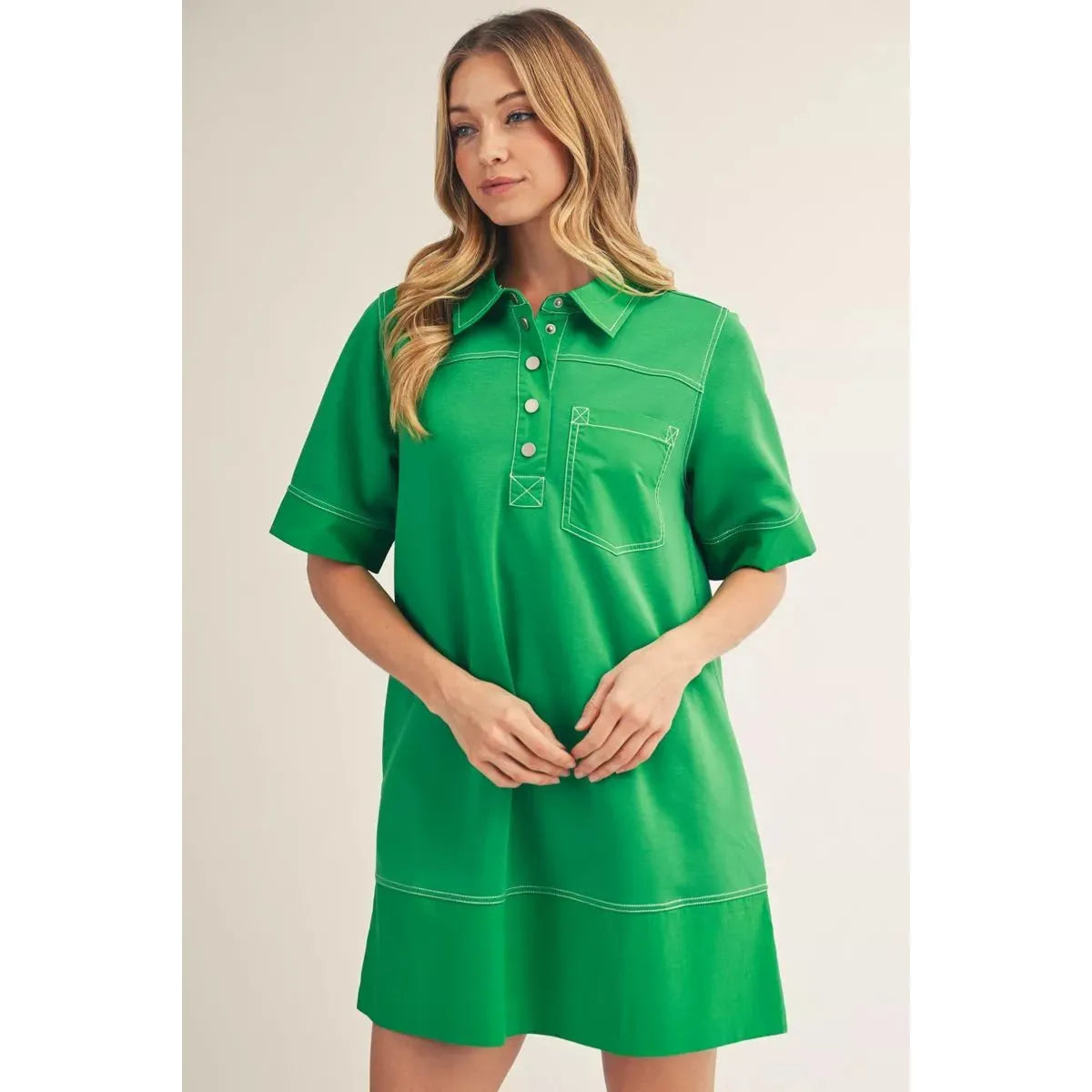 Sutton Kelly Green shirt dress with front button details and side pockets.