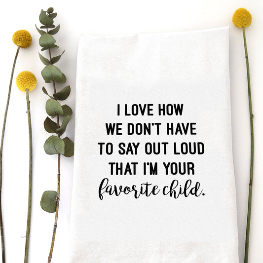 White cotton flour sack tea towel with "FAVORITE CHILD" printed in bold, clean black capital letters.