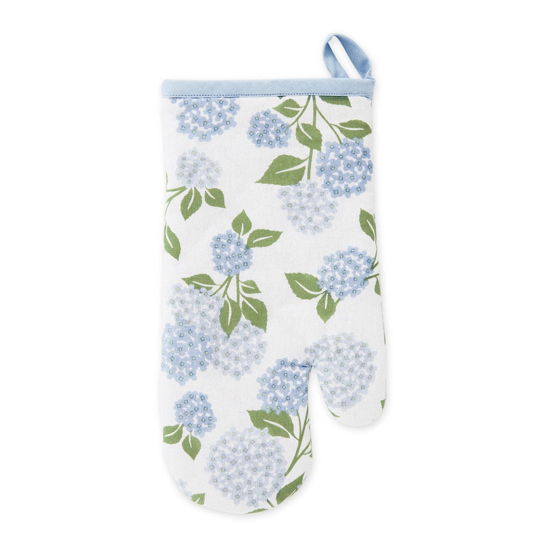 Floral printed oven mitt featuring blue and purple hydrangea botanical patterns on a crisp white 100% cotton fabric.
