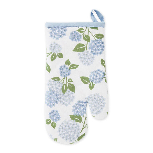 Floral printed oven mitt featuring blue and purple hydrangea botanical patterns on a crisp white 100% cotton fabric.