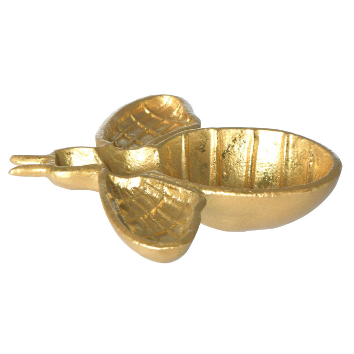 Close-up of the textured cast iron and gold metallic finish on the Creative Co-Op bee dish.