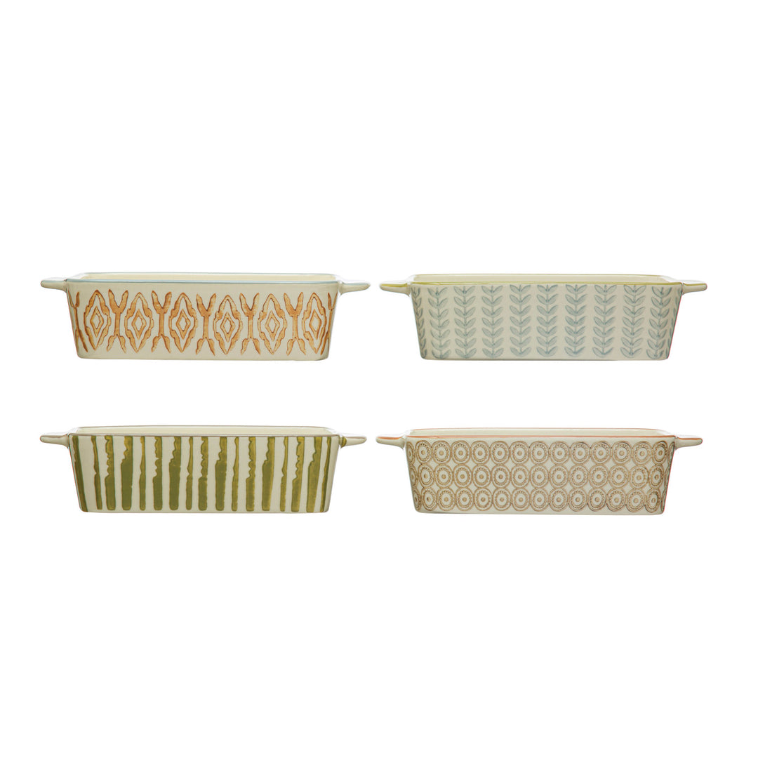 Set of four hand-stamped stoneware mini bakers with unique colorful patterns and 2.5-cup capacity.