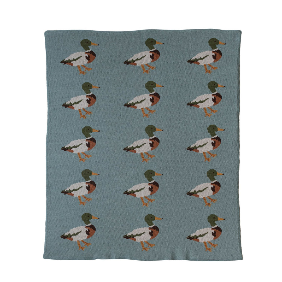 Close-up of multicolor cotton knit baby blanket with mallard duck pattern.