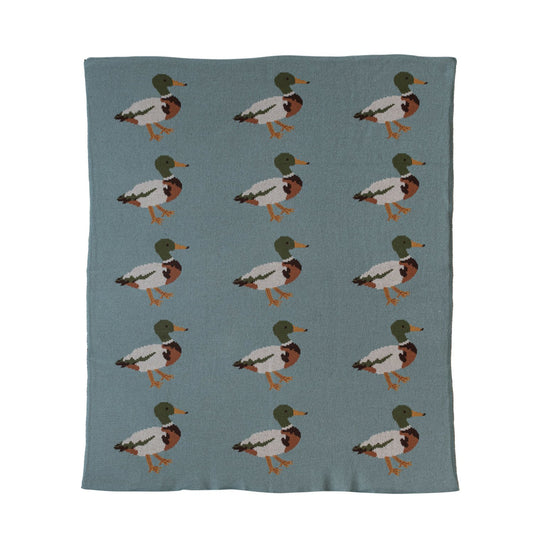 Close-up of multicolor cotton knit baby blanket with mallard duck pattern.