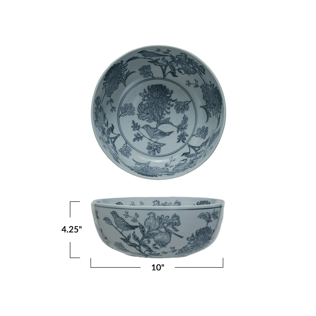 close-up of the textured stoneware and hand-stamped blue bird motif on the Creative Co-Op Aviary Garden bowl.