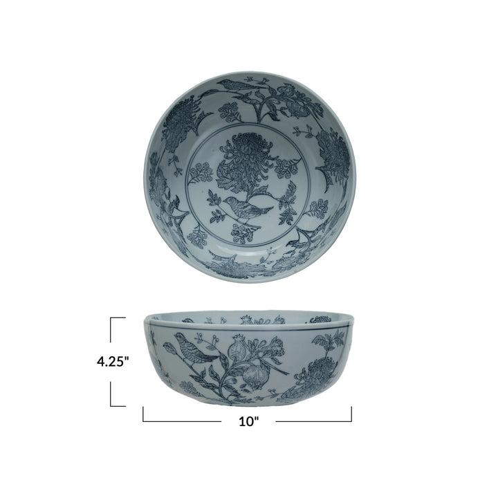 close-up of the textured stoneware and hand-stamped blue bird motif on the Creative Co-Op Aviary Garden bowl.